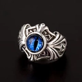 Retro punk adjustable open ring featuring a deep blue dragon eye and silver flame relief - Adjustable Open / Lace Border Devil Eye Blue