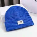 Bright blue knit beanie with Confident label and folded cuff for winter fashion - 56-58cm / Blue