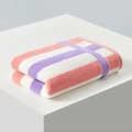 Plush 100g cotton face towel with pink and purple stripes on a display stand - 34*76cm / Purple Pink