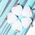 Set of five white heart-shaped crystal pendants with silver metal clasps for DIY jewelry - Smelted White