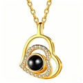 Gold heart-shaped projection necklace with zircon detailing and a black center stone - Double Slant Heart Gold