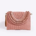 Pink straw woven clutch bag with tassel fringe detail and brown leather wrist strap - Pink Raffia
