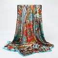 Close-up of colorful paisley silk scarf with glossy satin finish and blue rolled edges - Multicolor Painted Paisley (FT267-1)