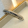 Elegant silver polished metal spring hair clip for ponytail on a beige velvet display - Silver Bar