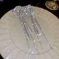 Detail of silver camellia tassel earrings with rhinestones on white ceramic plate - Silver Tassel Silver Pin Earrings (135#)