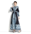 Detailed close-up of blue paisley print on black velvet dress with waist belt - S / Black