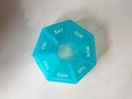 Octagonal 7-day pill organizer in transparent blue finish with white weekday labels - Lake Blue