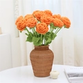 Handmade crochet orange rose bouquet with green leaves in a woven basket - Orange