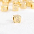 Macro shot of 18k gold plated cube bead with sparkling cubic zirconia letter R detail - R (Single Pendant)