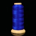 Deep royal blue braided nylon cord on a spool for DIY jewelry making and beadwork - Sapphire Blue