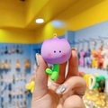 Cute purple tulip resin keychain accessory with cartoon face and gold metal ring - Tulip Single-Purple