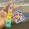 Porte-clés jouet sensoriel arc-en-ciel avec pendentif coloré en forme de fruit du dragon - Style Fruit du Dragon