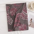 Gray cashmere-like scarf with red paisley print and tassel edges on soft fabric - Paisley Dark Grey
