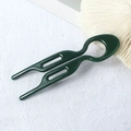 Detail view of dark green U-shaped hair pin with a matte finish and hollow design - 9cm Fishtail Double Fork - Dark Green / 9cm U Plug