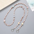 Detail of beaded crossbody phone strap with colorful number charms and silver rings - Crossbody Chain / Champagne