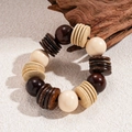 Detailed view of vintage wooden beads and coconut shell bracelet with natural textures - Multi-color Patchwork Style (White Bracelet)