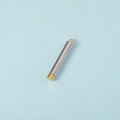 Detailed macro view of a silver and gold cylindrical nesting pendant for DIY jewelry - Gold (Inner) + Steel Color (Outer)