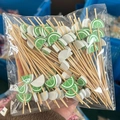 Bamboo cocktail picks with green lime slice decor in transparent packaging - 12cm/100 Packs / Lime