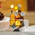 Detail of glowing resin Christmas train station with warm LED lights and snowy roof - Style 302-1 C (Train Station)