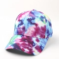 Close-up of a vibrant 3D tie-dye baseball cap with colorful gradient patterns and curved brim - Adjustable / Blue Green Burgundy Tie-Dye