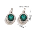 Macro detail of oval green gemstone pendant showing 23mm length and 13mm width dimensions - Steel Color Oval Pendant - Green Zirconia