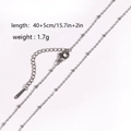 Silver stainless steel bead chain necklace 40+5cm with lobster clasp in studio shot - Small O-chain Bead Chain / Steel