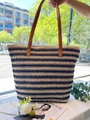 Detail of blue and beige striped raffia tote bag with premium brown leather handles - Blue and White Stripes