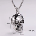 Colgante calavera punk en acero inoxidable con dimensiones de 52mm por 32mm - Color Plata (Sin Cadena)