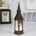 Vintage bronze Christmas lantern with LED light and snowman miniature in church design - Water-filled Snowman