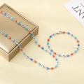 Zilveren sieradenset met blauwe en rode boze oog hangers inclusief ketting en armband - Armband 19CM / Kleurrijk