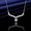 Silver plated necklace featuring a round sparkling pendant with V-shaped diamond accents - Angel Wings Necklace Xl-161