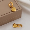 Polished 18K gold-plated heart pendant earrings for women on a jewelry gift box - Gold Heart Pendant Hoop Earrings