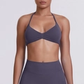 Detail of purple seamless halter sports bra and high-waisted yoga leggings set - Truffle