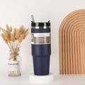 Navy blue 30oz vacuum insulated stainless steel tumbler with straw on a clean pedestal - 890ml / Navy Blue (Straight Style)