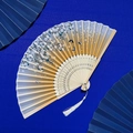 Traditional bamboo folding fan with white cherry blossoms and elegant butterfly print - Pale Yellow Gradient Cherry Butterfly