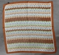Carré de soie synthétique 70x70cm avec motifs géométriques orange et vert et bordure orange - Imprimé léopard