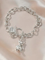 Silver chain bracelet with OT clasp, featuring a vintage cross tag and a 3D bear charm - Thick Chain Bracelet / Silver