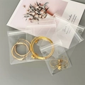 Eco-friendly transparent EVA zip lock storage bags for jewelry and squeeze toys on a grey desk - Transparent EVA (13*13CM)