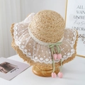 Handmade woven raffia straw sun hat with white lace embroidery and tulip floral charms - Pink