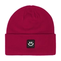 Close-up of deep magenta cuffed knit beanie with square black smile face patch logo - Burgundy