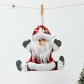 Detailed view of handmade Santa Claus ornament with red plaid hat and plush white beard - Santa Claus
