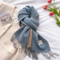 Flat lay of double-sided cashmere-like scarf in blue and khaki with fringe detail - Grey Blue