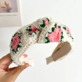 Knitted beige headband with 3D pink floral embroidery and soft high-top design - Pink Flower Knotted Knitted Headband