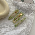 Three green resin hair clips with golden metal base on a minimalist paper background - Sakura 3Pcs Set - Grass Green