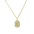 Macro detail of gold plated rectangle pendant with letter K and pavé cubic zirconia - Necklace K