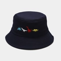 Close-up of colorful dinosaur embroidery on a navy cotton twill bucket hat for kids - M (56-58cm) / Navy Blue