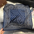 Detail of navy blue paisley silk scarf with heart patterns on a white plush rug - 68*68cm / Dark Blue