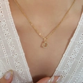 Vergulde titanium stalen ketting met sprankelende diamanten letter D hanger luxe - Letter D / Goud