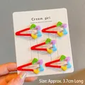 Set de cinco pinzas para el cabello coloridas con forma de estrella estilo Y2K - Globo de Estrella Fugaz Arcoíris