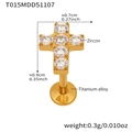 Detail view of a gold cross piercing made of titanium alloy with zircon inlay - Gold Lip Stud (T015)